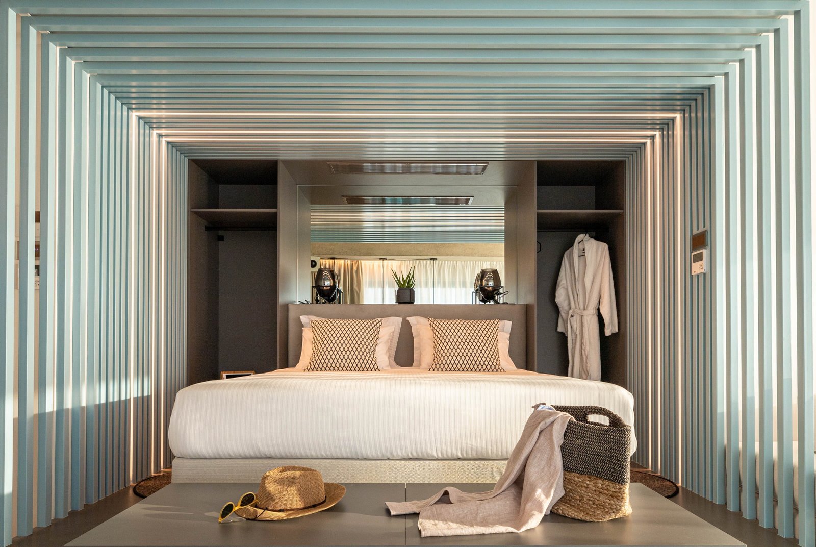 Urban Suites bright bedroom with city view